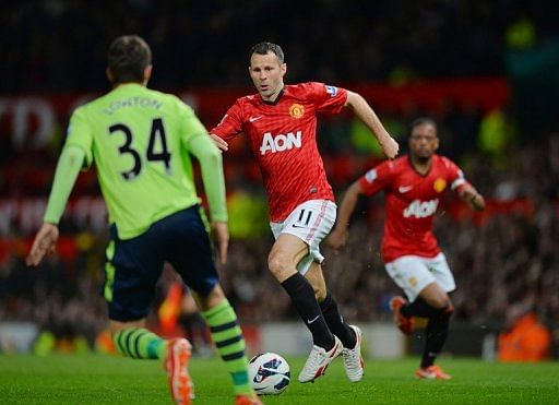 Manchester United's Ryan Giggs (C) is pictured during their Premier League match against Aston Villa on April 22, 2013